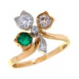AN EMERALD AND DIAMOND FLOWER RING, EARLY 20TH C in gold marked 18ct, 3.9g, size K++Good condition