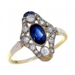 AN ART DECO SAPPHIRE AND DIAMOND RING, C1930 with larger oval central sapphire and pierced