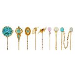 NINE VICTORIAN AND LATER GOLD STICKPINS, C1870- EARLY 20TH with jewelled terminals, including aN