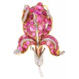 A RUBY AND DIAMOND ORCHID BROOCH with cabochon rubies and round brilliant and baguette cut diamonds,