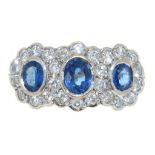 A SAPPHIRE AND DIAMOND RING IN 18CT GOLD, BIRMINGHAM 1994, 4.95G, SIZE P++GOOD CONDITION