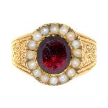 A GEORGIAN GARNET AND SPLIT PEARL RING IN GOLD, UNMARKED, 4.5G, SIZE N++ABRASION TO GARNET FACETS