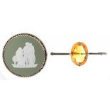 A WEDGWOOD CAMEO BROOCH IN SILVER, REVERSE INSCRIBED 1957 GF, 40 MM DIAM AND A CITRINE BAR BROOCH IN