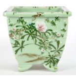 A CHINESE FAMILLE ROSE CELADON GLAZED SQUARE JARDINIERE, 25CM H, 20TH C