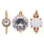 AN IMITATION DIAMOND SOLITAIRE RING, IN 14CT GOLD, LONDON POST 2000, ANOTHER AND AN OPAL RING,