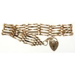 A 9CT GOLD BRACELET AND PADLOCK, LONDON 1979, 22CM L, 10.9G++GOOD CONDITION