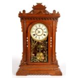 A NEW HAVEN STAINED WOOD MANTEL OR SHELF CLOCK, 54CM H, C1900