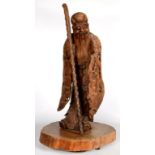 A CHINESE CARVED ROOT WOOD FIGURE OF AN IMMORTAL ON A BASE, EARLY 20TH C, 75CM H