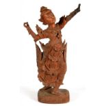 A SOUTH EAST ASIAN CARVED HARDWOOD FIGURE OF A GUARDIAN, 63CM H