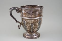 An Edwardian silver campana shaped pint mug with strapwork decoration,