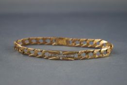 A modern 9ct gold textured and filed curb bracelet,
