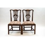 A pair of George III mahogany dining chairs with triple pierced splats and William Morris style