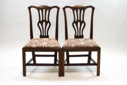 A pair of George III mahogany dining chairs with triple pierced splats and William Morris style