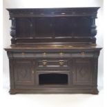 A Victorian carved oak sideboard with Jacobean style decoration,