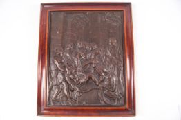 A bronze plaque of the dead Christ supported by several of his disciples and the Virgin Mary,