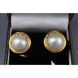 A pair of 18ct gold, mabe pearl and diamond round clip earrings,