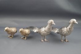 A pair of small Asiatic pheasant table ornaments, marks not traced, each approx.