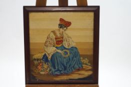 A Victorian Berlin woolwork picture of the Young Queen Victoria, in rosewood frame,