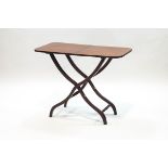 A Victorian mahogany folding coaching table on X-frame and turned supports,