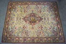 A 20th century Persian style machine woven rug,