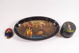 A 20th century Russian lacquered barrel shaped box and cover, painted with a figure in a landscape,