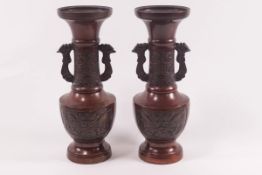 A pair of Chinese painted bronze two handled vases, of archaic form and decoration, unmarked,