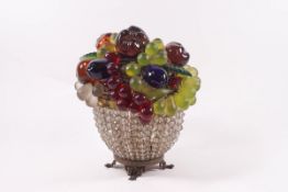 A table lamp, the shade in the form of moulded multi-coloured glass fruit on a beaded glass bowl,