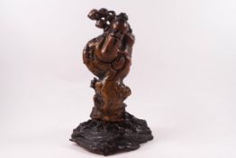A Japanese root carving in the form of a Wiseman on additional root plinth,