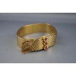 A 1960/70's ruby and brick-link bracelet,