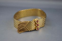 A 1960/70's ruby and brick-link bracelet,