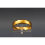 A 22ct gold wedding band, Birmingham 1917, size M, 3.4g.