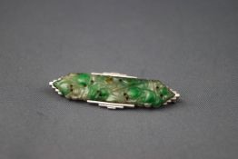 An Art Deco white gold and jadeite brooch,