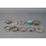 Ten various silver and white metal rings,