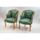 A pair of French style armchairs,