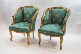 A pair of French style armchairs,