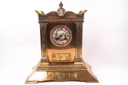 A French lacquered brass clock,