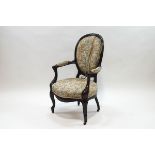 A French style stained mahogany and upholstered elbow chair,