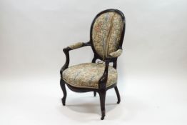 A French style stained mahogany and upholstered elbow chair,