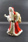 A Royal Doulton figure of Father Christmas, HN3399, modelled by Robert Tabenor, 23cm high,