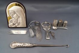A group of small silver items, including; a silver mounted button hook,