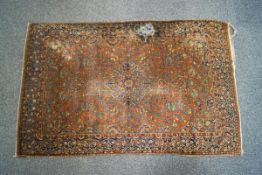 A late 19th/early 20th century finely woven Persian rug,