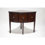 A George III and later mahogany corner sideboard,