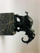 After Milo, a bronze model of an elephant on a striated brown marble base, signed,