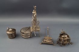 A Group of five Continental miniature toys, comprising; a spinning wheel (lacking two legs),
