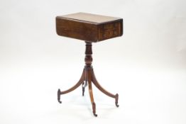 A 19th century mahogany drop leaf sewing table,