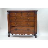 A Victorian mahogany bow front chest of two short over three long drawers,