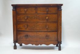 A Victorian mahogany bow front chest of two short over three long drawers,