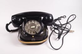 A Belgium MFG company Bell telephone with brass carrying handle