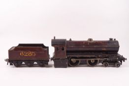 A Bassett Lowke O gauge locomotive and tender, no.