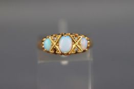 An Edwardian 18ct gold, opal and diamond ring,